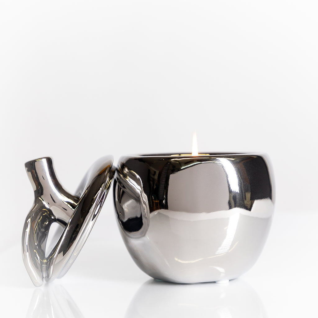 silver-ceramic-apple-candle-with-decorative-lid-filled-with-soy-wax-and-cotton-wicks